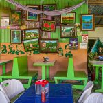 Restaurant in Costa Rica mit naiven Gemälden und Schablonenportraits südamerikanischer Politiker / © Foto: Georg Berg
