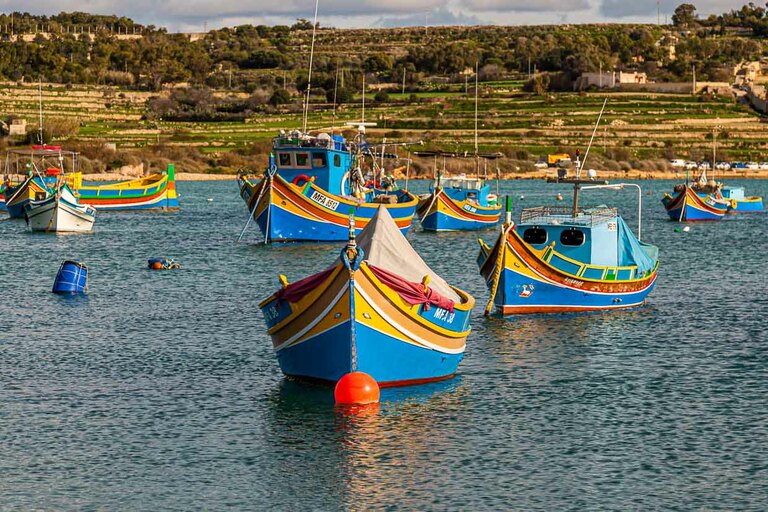Fishing port in Marsaxlokk, in the southeast of Malta. There are ports large and imposing like that of the capital Valetta, but small fishing ports characterize the varied coast of Malta and Gozo / © Photo: Georg Berg