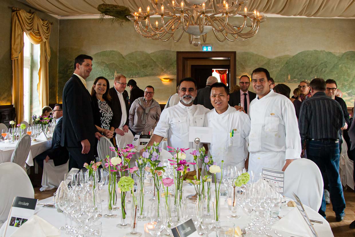 Michelin-starred chef Vineet Bhatia (l.) with two colleagues / © Photo: Georg Berg