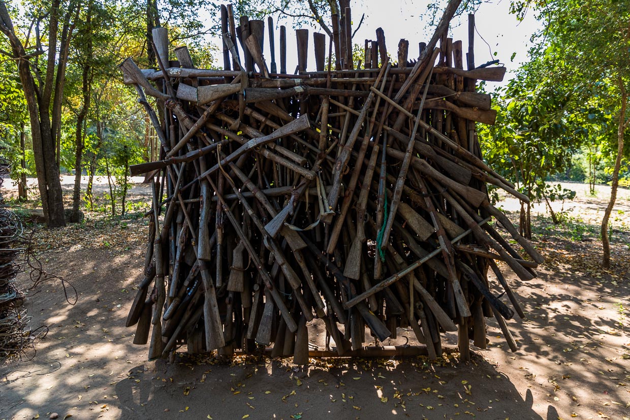 Collection of confiscated guns at Majete Wildlife Reserve. The park management of African Parks has assembled them into a memorial against poaching / © Photo: Georg Berg